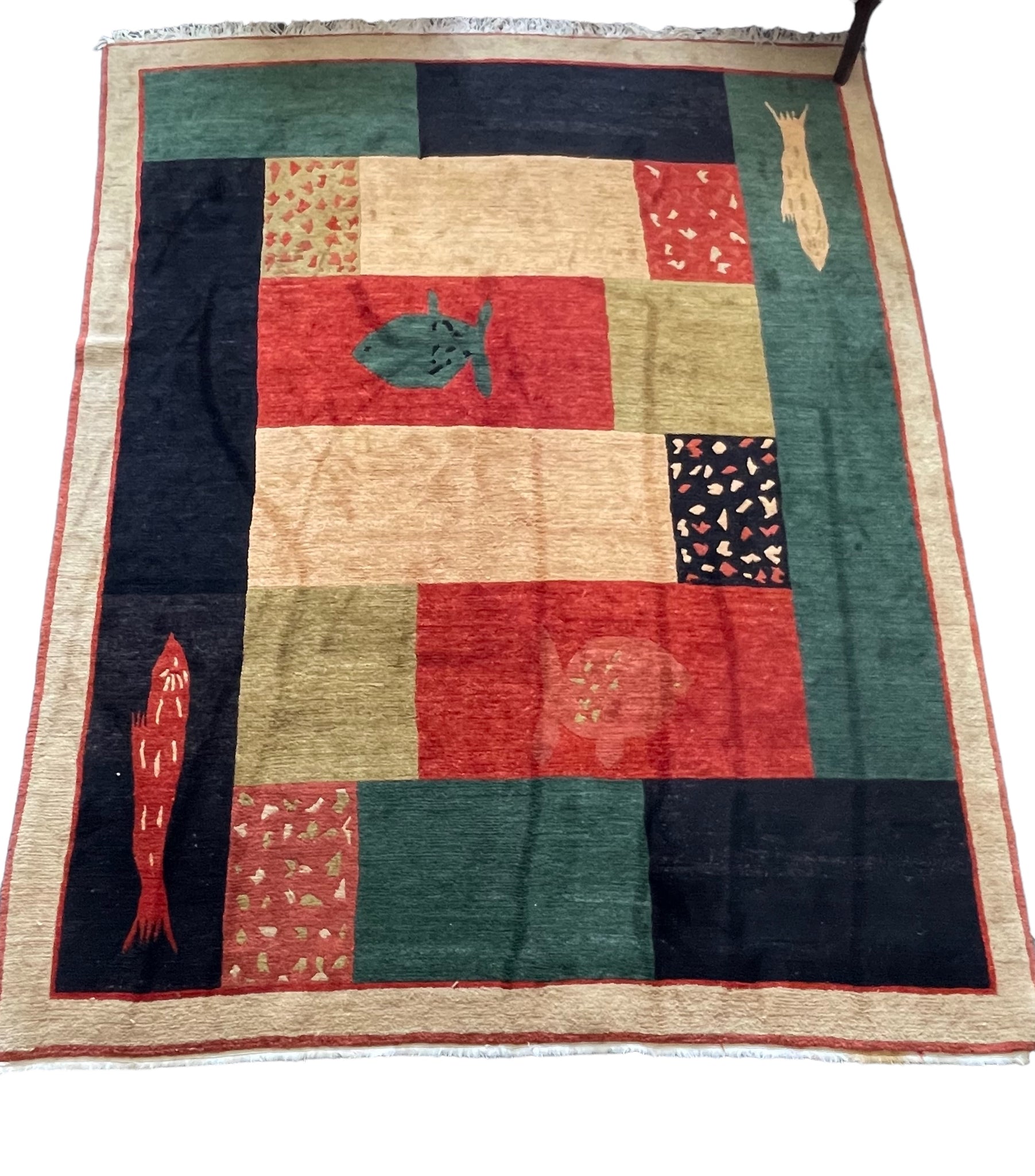 Uniquely Patterned Hand Loomed Wool Rug with Multiple Blocks of Color and Fish