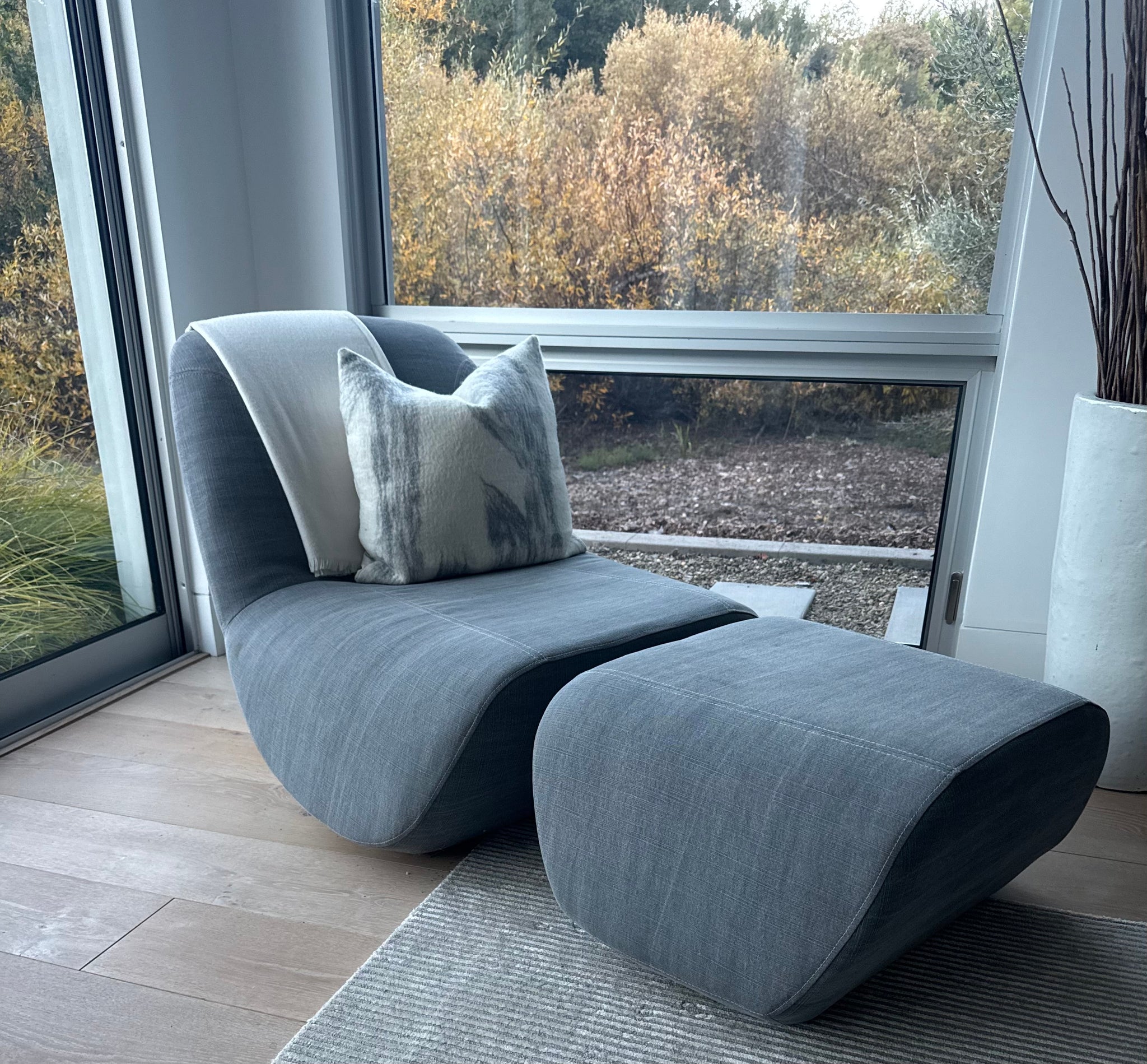 Custom Grey Upholstered Chair and Ottoman